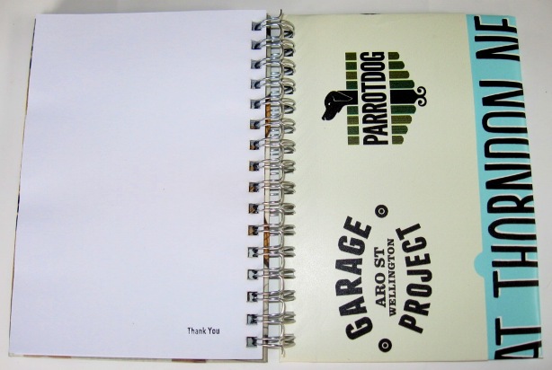 Last page view of the recycled poster notebooks featuring Celia Wade-Brown Ale